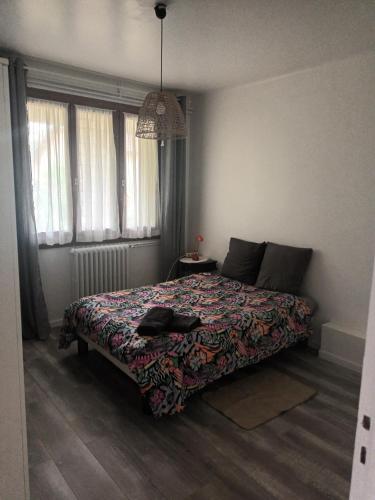 Postel nebo postele na pokoji v ubytování Yasmine