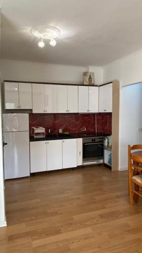 ครัวหรือมุมครัวของ Dea Apartment