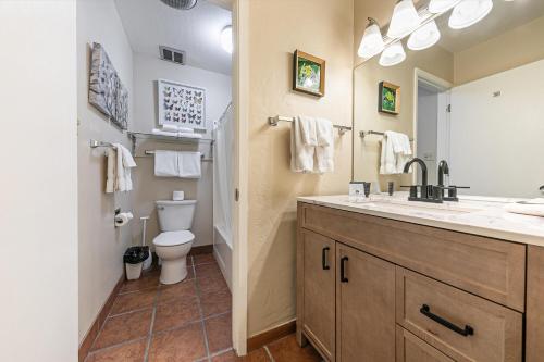 a bathroom with a sink and a toilet at Cozy Studio wKitchen #217 at Donner Lake Village in Truckee