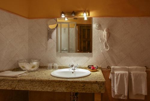 Ett badrum på Casa Rural La Chimenea
