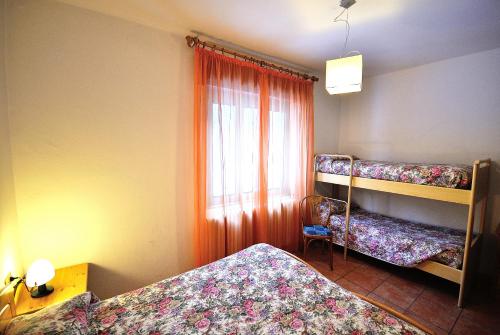 Posteľ alebo postele v izbe v ubytovaní Albergo Morandi
