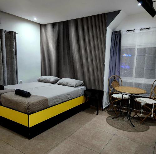 Llit o llits en una habitació de Amdar boutique