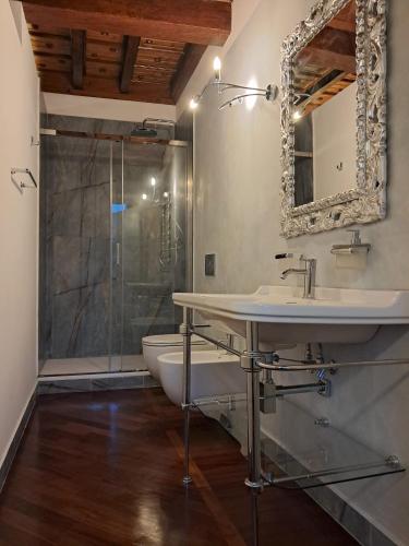a bathroom with a sink and a shower at Borgo dei Duchi in Rivarolo Mantovano