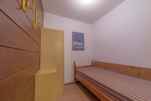 Katil atau katil-katil dalam bilik di Residence Petit Tibet
