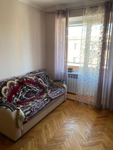 Postel nebo postele na pokoji v ubytování квартира в центре