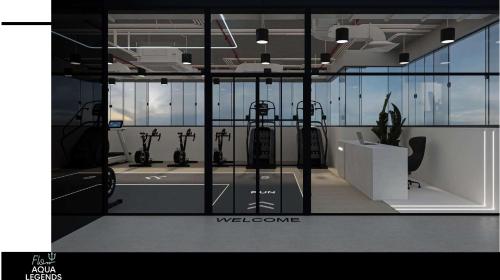 a view of a room with a gym at Flow Aqua Legends Resort Sahl Hasheesh in Hurghada