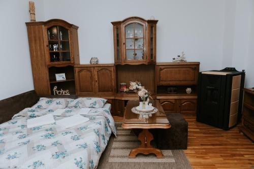 a living room with a couch and a table at Apartman Antonio in Gospić