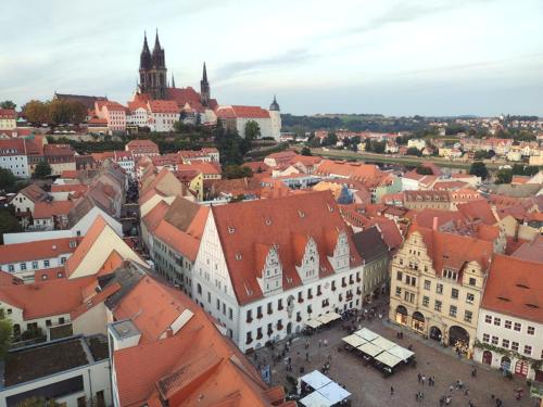 an aerial view of a city with red roofs at zu den blauen Schwertern in Meißen
