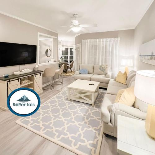 a living room with a couch and a tv at Family perfect getaway 2 bedroom apartment in Rehoboth Beach