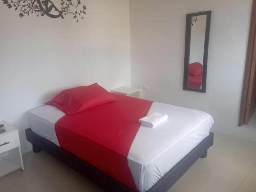 เตียงในห้องที่ Hostal Tamara