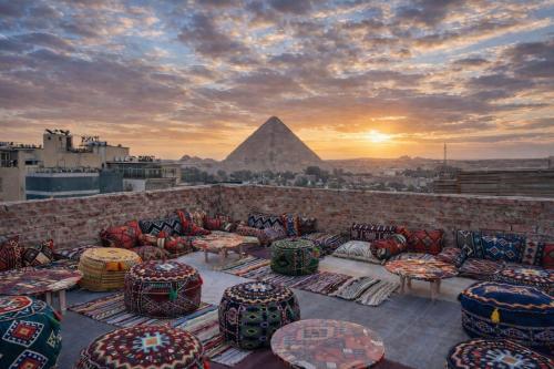 Brassbell l By the Pyramids Near Grand Museum
