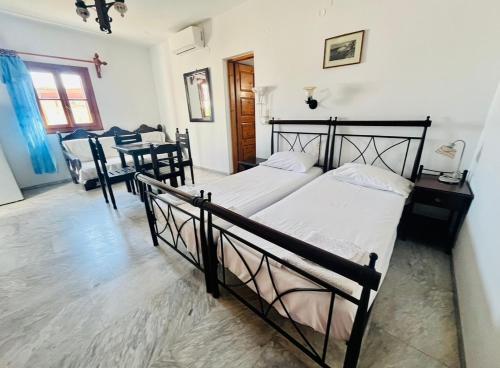 Postel nebo postele na pokoji v ubytování Villa Vasilis