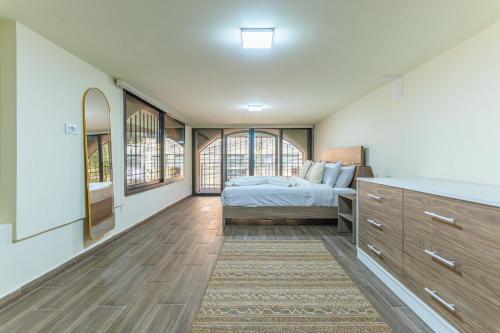Llit o llits en una habitació de Casa Serena - 2 BR, Batroun
