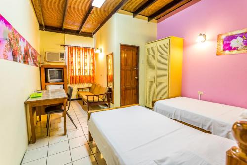 Katil atau katil-katil dalam bilik di Par-May-La's Inn