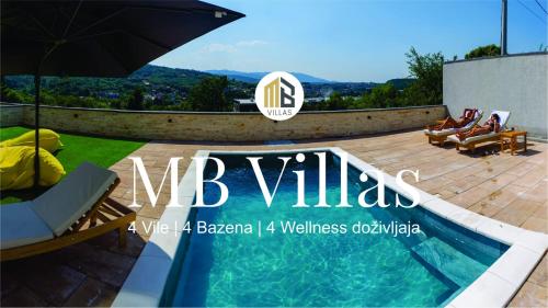 a villa with a swimming pool and an umbrella at MB Villas in Vrnjačka Banja