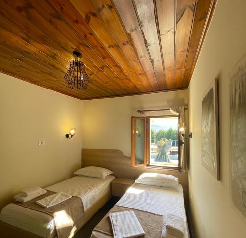 Llit o llits en una habitació de Kriva Resort