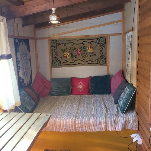 En eller flere senge i et værelse på Sauna house