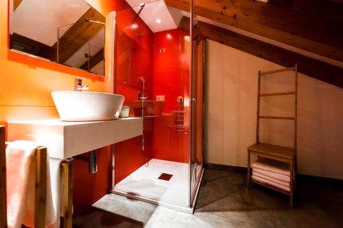 a bathroom with a sink and a shower at El Mirador Del Alcazar in Segovia