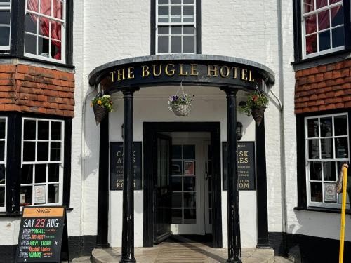 a building with a sign that reads the bridge hotel at The Bugle Hotel in Fareham