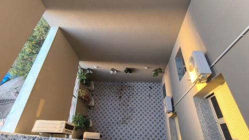 an overhead view of a balcony of a house with plants at Soul Appart DZ in Kouba