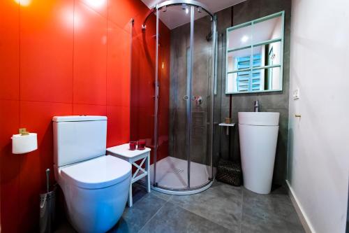a bathroom with a shower and a toilet in it at El Mirador Del Alcazar in Segovia