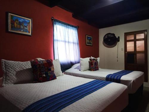 Llit o llits en una habitació de Emma Hostel