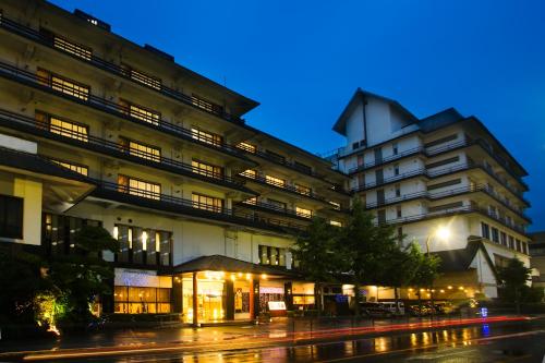 a large building at night with a street in front at Tokiwa in Yamaguchi