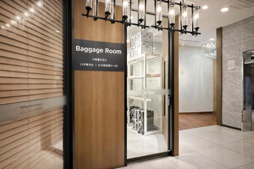 a store with a sign on the door of a store at Hotel Bernoui Seoul in Seoul