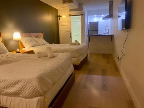 Llit o llits en una habitació de Ranch House Inn