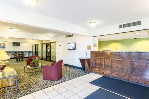 a lobby with a bar in the middle of a room at Americas Best Value Inn Edgewood, MD in Edgewood