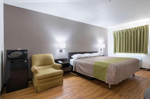 Ένα ή περισσότερα κρεβάτια σε δωμάτιο στο Motel 6-New Iberia, LA