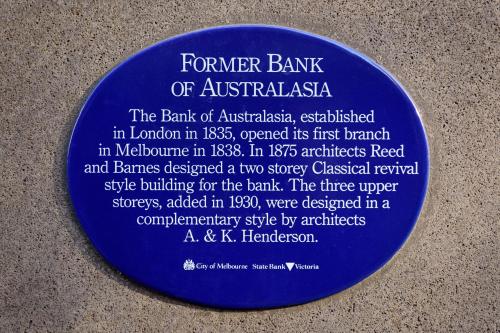 a blue frisbee with a plaque on the ground at Treasury on Collins Melbourne in Melbourne