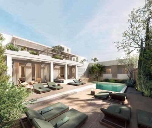 an external view of a villa with a swimming pool at Meros, Santikos Collection in Naousa