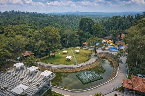 an overhead view of a park with a water park at Regenta Resort Sakleshpur in Sakleshpur