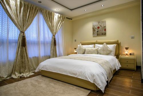 The Landmark Suites Westlands, Nairobi- Next to Westgate Mallにあるベッド