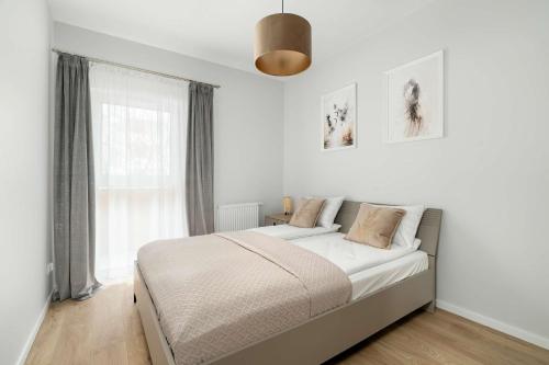 Modern Apartment with Parking & Balcony Remote Work Malta Lake Area by Renters Prestige