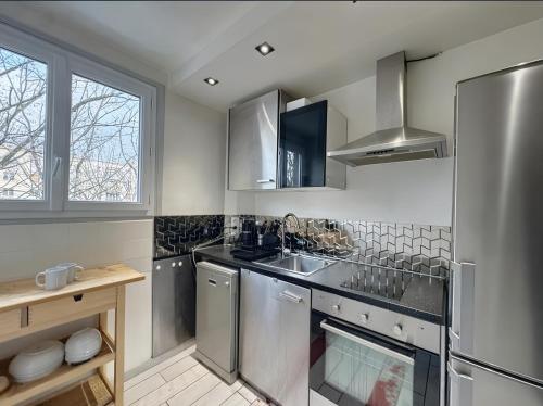 Kuchyň nebo kuchyňský kout v ubytování Appartement