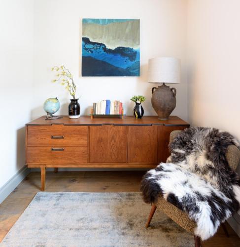 a living room with a wooden dresser and a couch at Pet-Friendly Luxury Home The Butler Collection in Brighton & Hove