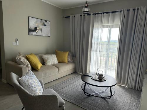 Zona d'estar a Allure Apartment