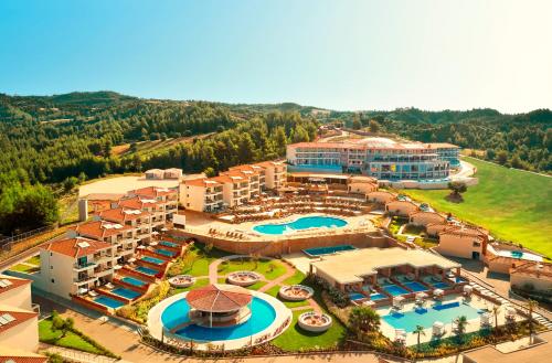 an aerial view of a resort with a pool at Zeus Eleva Ajul in Agia Paraskevi