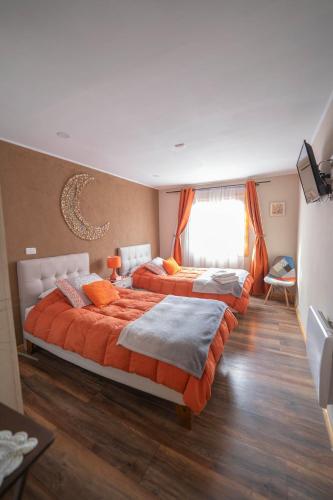 Llit o llits en una habitació de Hostal Apuwara