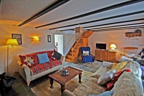 a living room with a couch and a table at 3 Bed in Cahirciveen oc-i417 in Reenard Cross
