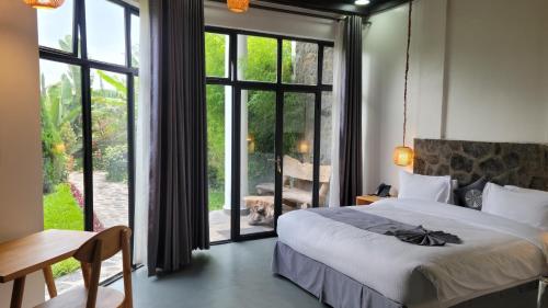 Llit o llits en una habitació de Grotta Resort