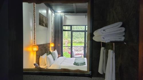 Llit o llits en una habitació de Grotta Resort