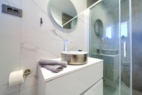 a bathroom with a sink and a mirror at Luxury-relax residence Muraj in Kornić