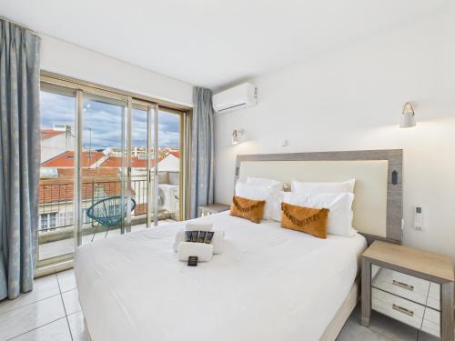 Foto Central -300m Palais- Seaview-A/C-WIFI-spacieux 2