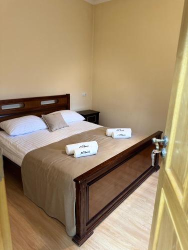 Tempat tidur dalam kamar di NOYemi