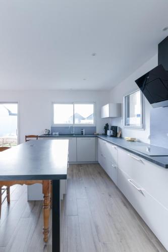 Foto TY NEVEZ - Jolie maison neuve avec petite vue mer 5