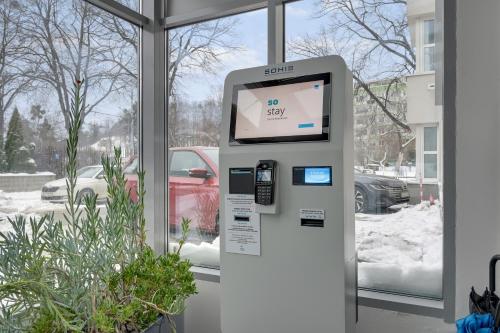 a sap pay machine in front of a window at So Stay Bed & Breakfast - Self Check-in in Gdańsk