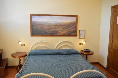 Posteľ alebo postele v izbe v ubytovaní Hotel Pallotta
